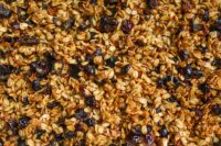 a close up of granola with raisins